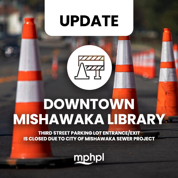 MPHPL downtown Third Street closed Reflective traffic cones on the street. ‘Downtown Mishawaka Library Third Street parking lot entrance/exit is closed due to city of Mishawaka sewer project’