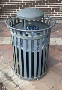 Photo of one of the three outdoor trash cans before the restoration. 