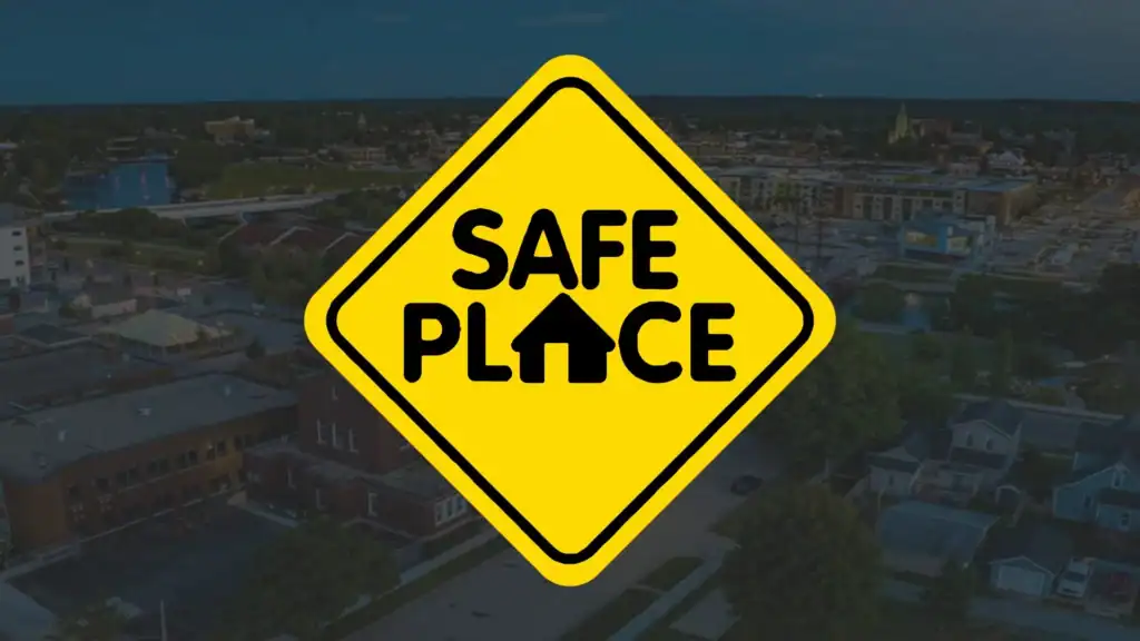 Save Place logo over an aerial view of a suburban neighborhood.