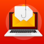 A fishing hook going into an envelope on a computer screen monitor.