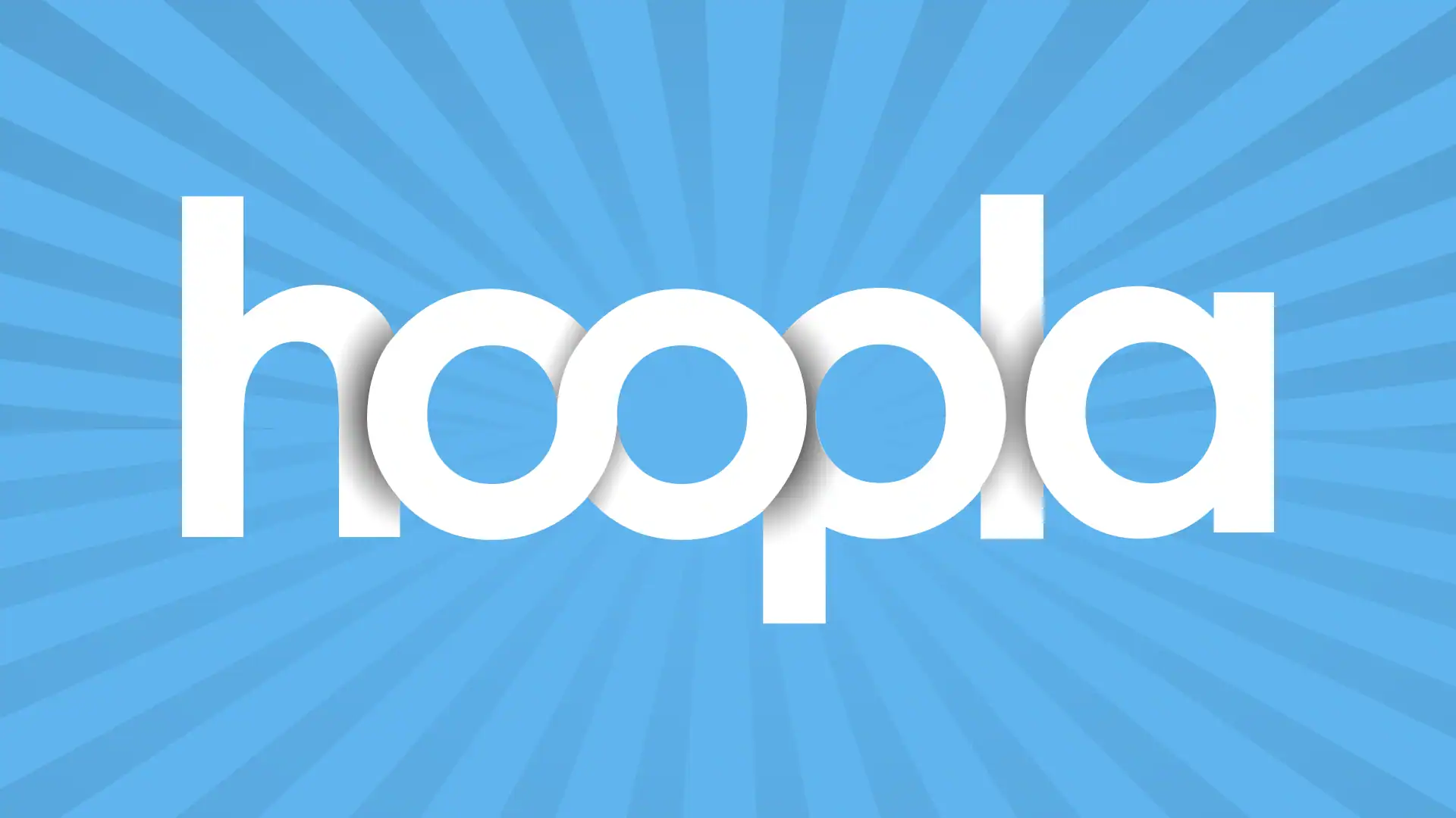 The word hoopla in bold white lowercase letters is centered on a blue background with radiating lines, creating a sunburst effect.