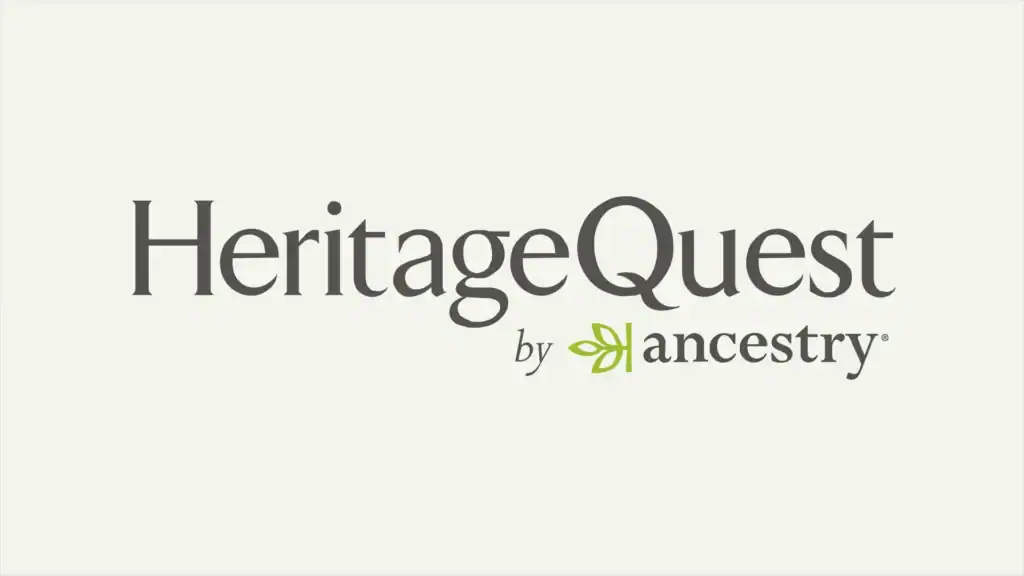 Heritage Quest logo featuring the title in large, grey text and text below reads 'by' with the ancestry logo on an off white background.