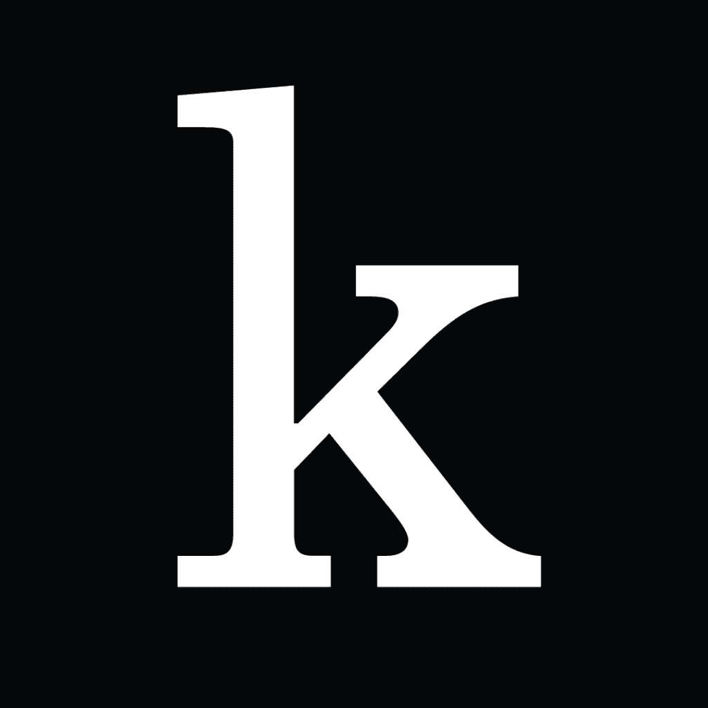A white lowercase letter k in a serif font on a solid black background, perfect for promoting your summer reading challenge or other reading challenges.